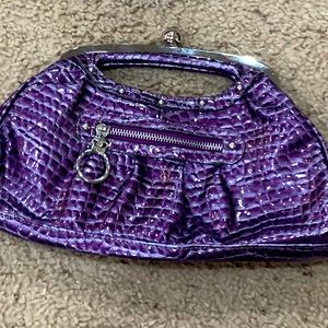 Purple gator clutch